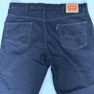 EUC Levi's 550 Relaxed Black Jeans Men actual 40x30 Denim Dark Wash Cotton